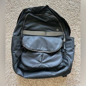Lululemon backpack with detachable crossbody purse.